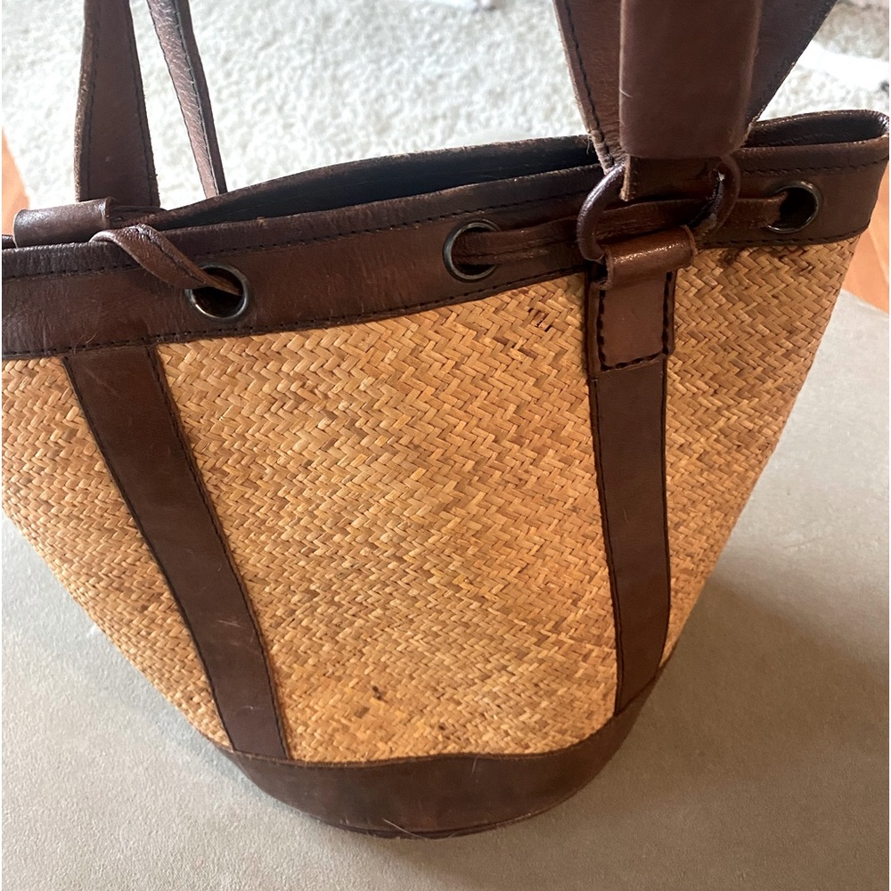Beautiful leather and rattan designer bucket bag